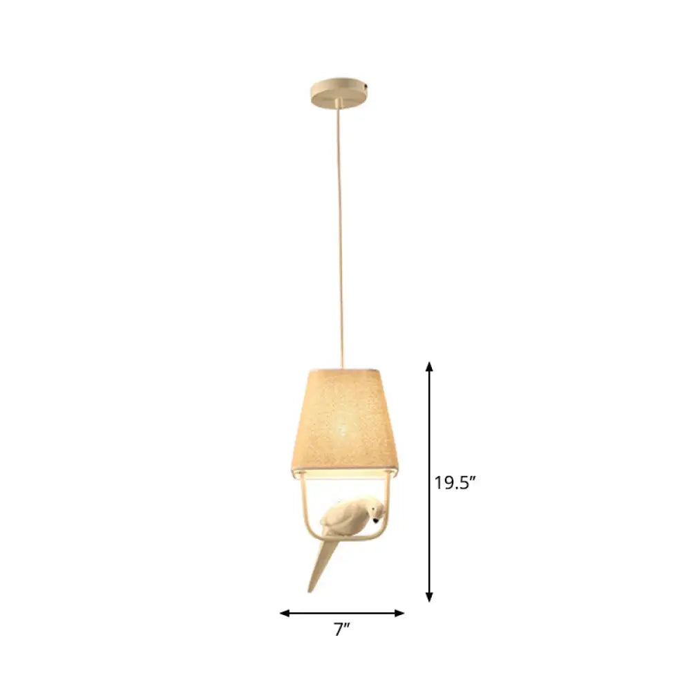 Adeline - Trapezoid Fabric Pendant Light With Resin Bird In Beige 1 /