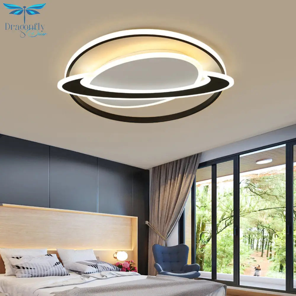 Cosmic Bedroom Glow: Black - White Acrylic Led Flush Mount Ceiling Light With A Ringed Planet Design