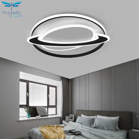 Cosmic Bedroom Glow: Black - White Acrylic Led Flush Mount Ceiling Light With A Ringed Planet Design