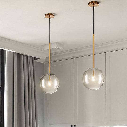 Sylvie - Minimalist Single Gold Pendant: Clear Glass Globe Suspension Lighting