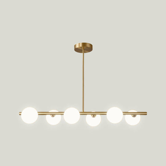 Gold Linear Island Pendant Light With Spherical Glass Shade - Perfect For Dining Table And