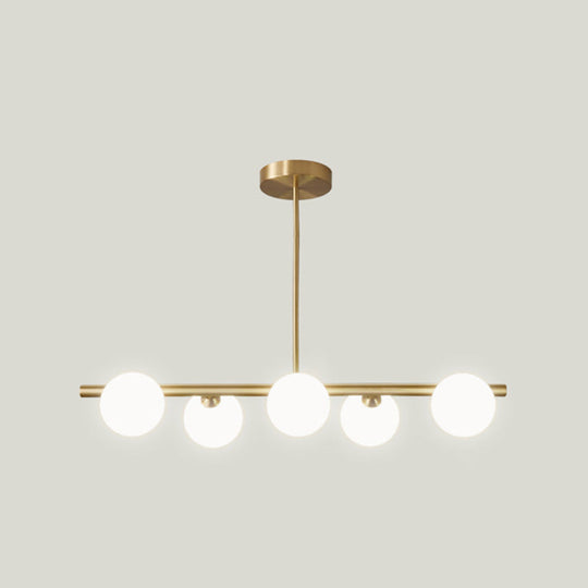 Gold Linear Island Pendant Light With Spherical Glass Shade - Perfect For Dining Table And