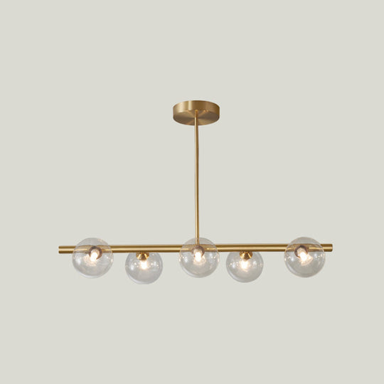 Gold Linear Island Pendant Light With Spherical Glass Shade - Perfect For Dining Table And